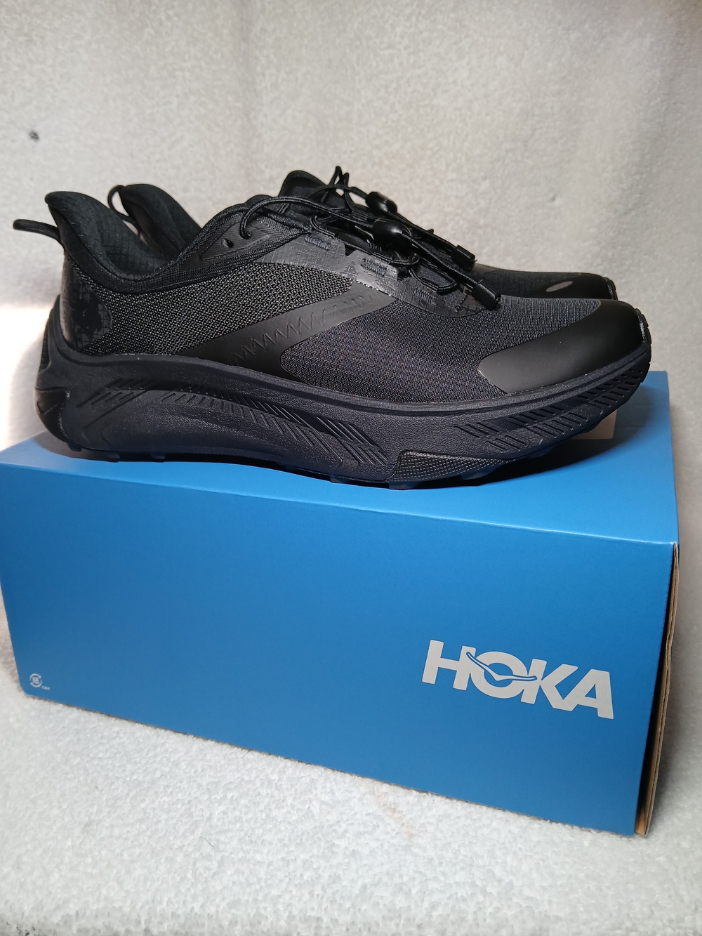 HOKA Women's Transport 2 all-adventure lifestyle and hiking sneakers.